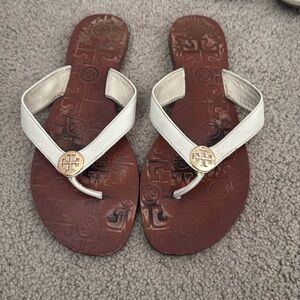 White Tory Burch sandals with gold emblem size 9